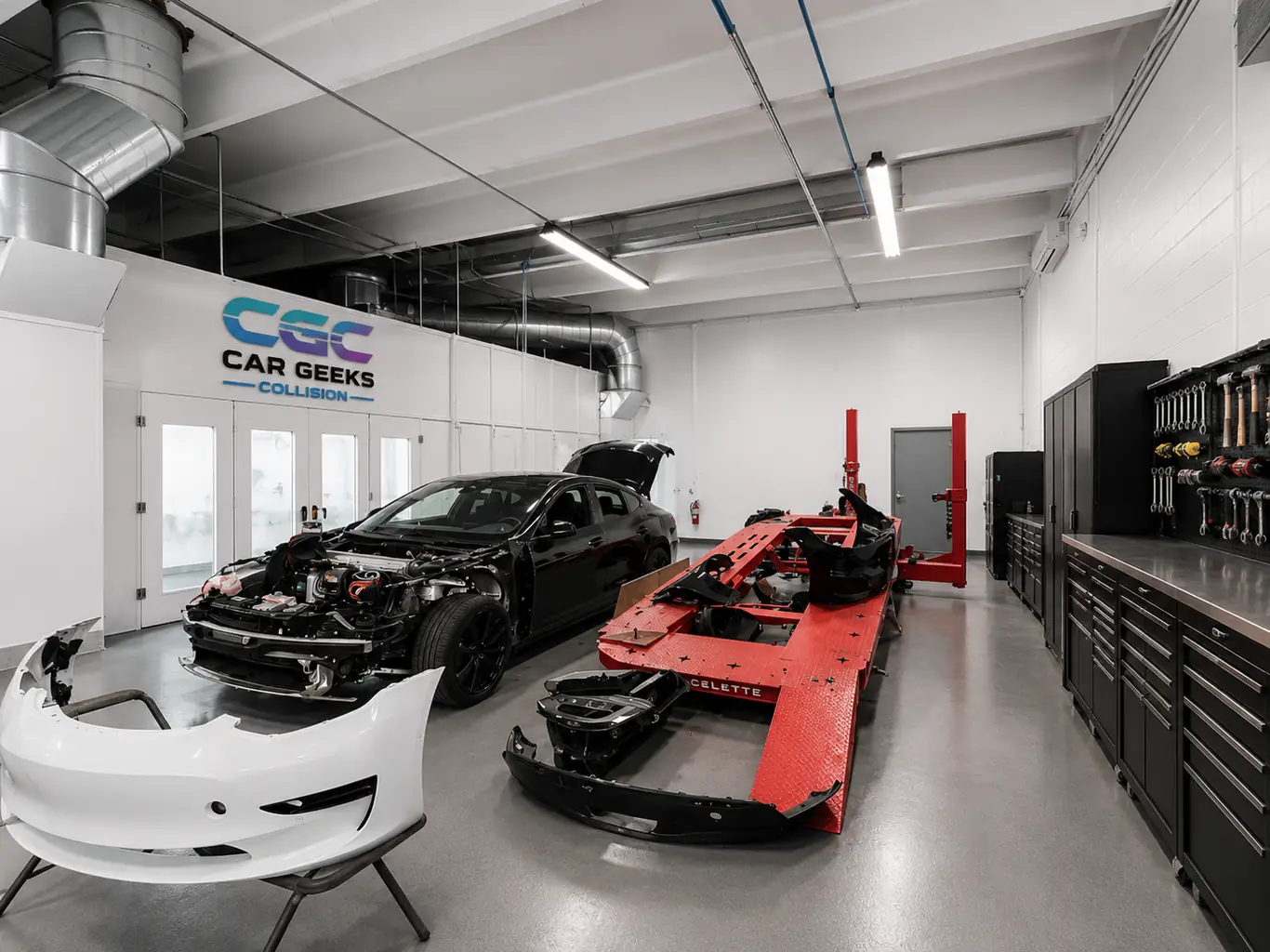 Vehicle positioned for structural measurement at the Car Geeks Collision repair bay in Hollywood, FL